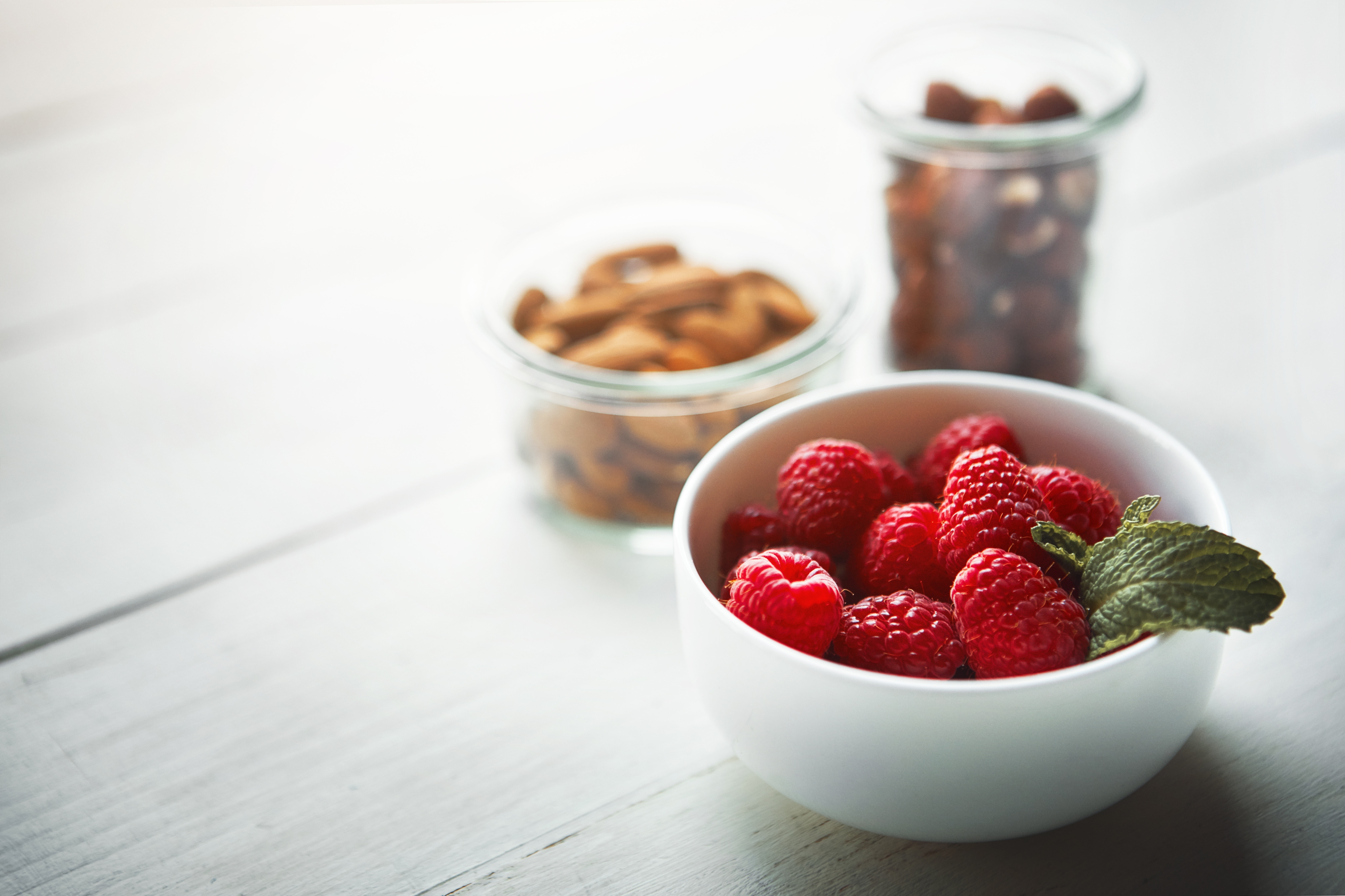 Table,,Wellness,And,Nuts,With,Berries,In,Bowls,For,Natural